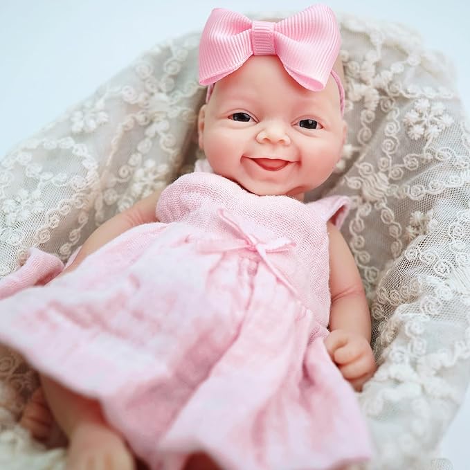 7" Reborn Babies Silicone Full Body Micro Realistic Newborn Doll Lifelike Eyes Open Smile Baby Girl Looking Real with Pink Dress Accessories for Kids Birthday Gift