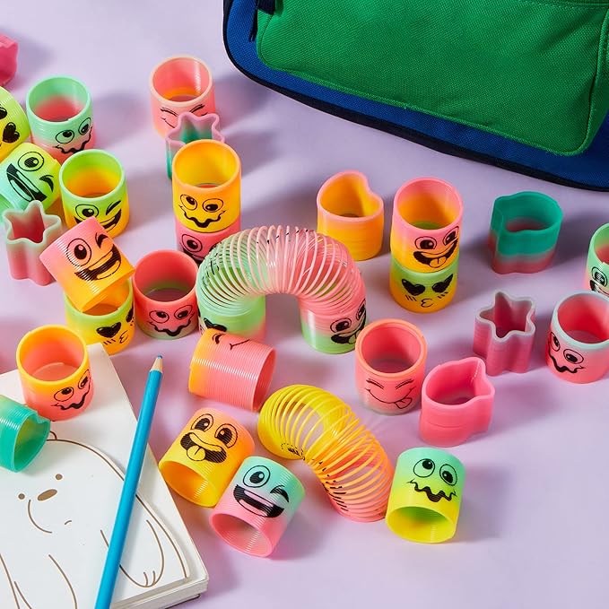 JOYIN 120 Pcs Spring Rainbow Party Favor, Mini Plastic Coil Spring Toy, Fidget Stress Coil Mini Springs Bulk Toys for Carnival Prize Birthday, Halloween Goodie Bag Stuffers